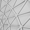 An intricate ceiling design featuring modern geometric patterns and steel structures in a low angle shot.